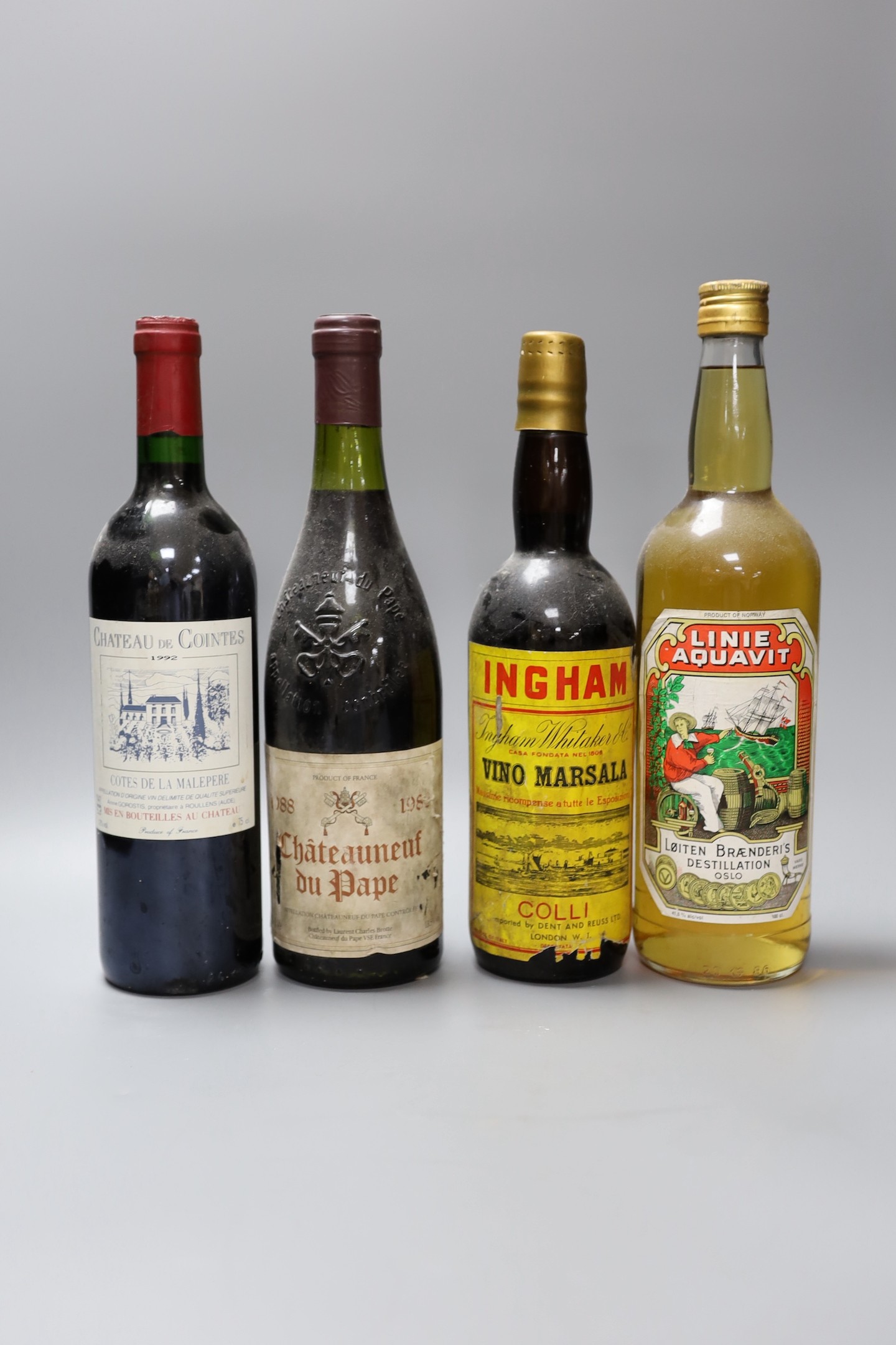 A selection of nine bottles of alcohol, to include Châteauneuf du Pape, Linie Aquavit, and others